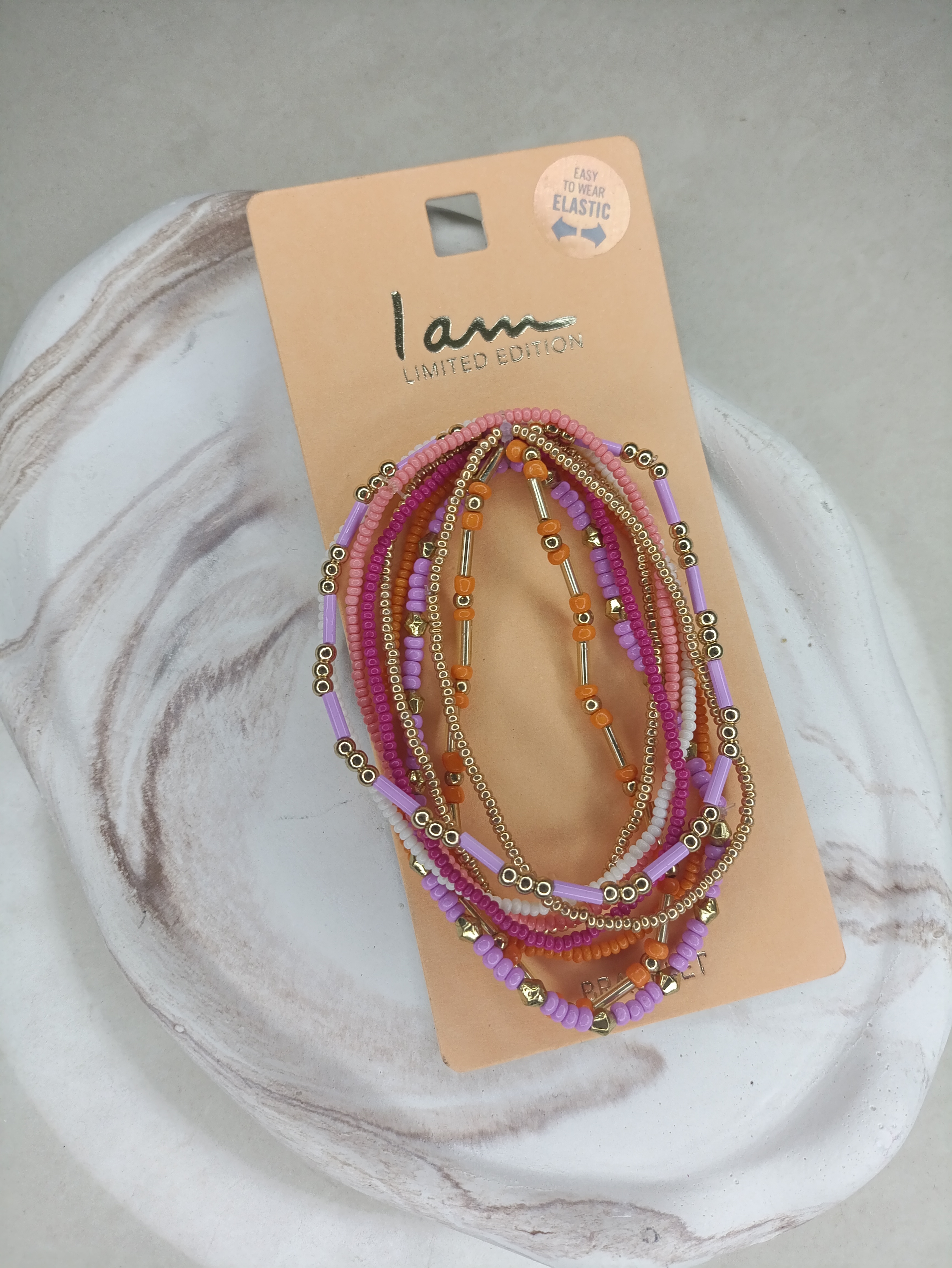 ست ۹ عددی دستبند مهره‌ای رنگی – با قیمت یک دستبند